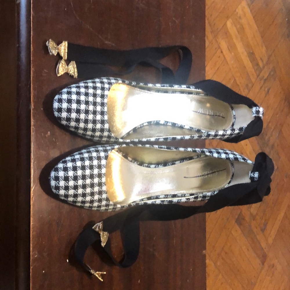 Black and cream checkered pumps